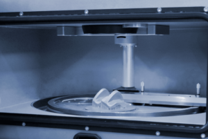 3d printer being used to print out a mouth piece